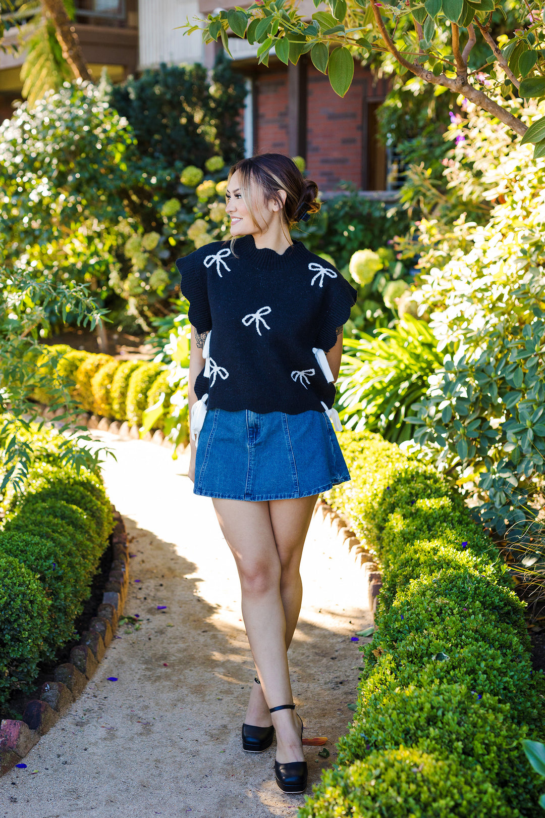 The Ribbons & Bows Black Knit Sweater Vest