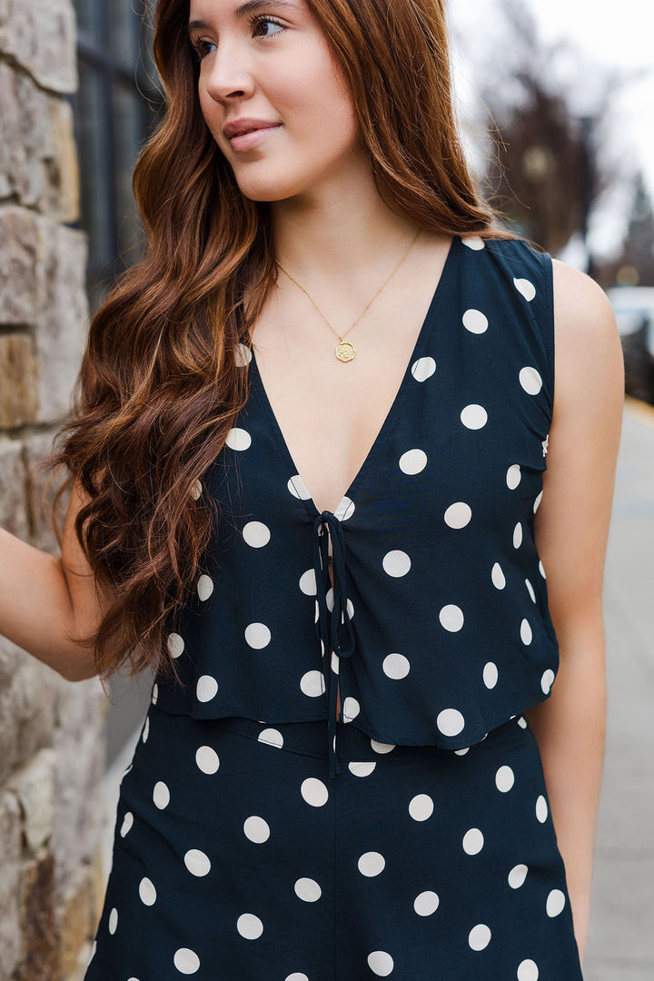 The Riviera Black Polka Dot Tie Front Top