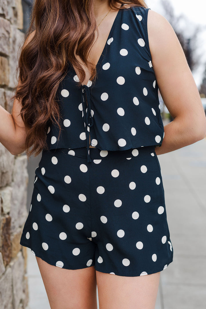 The Riviera Black Polka Dot Tie Front Top