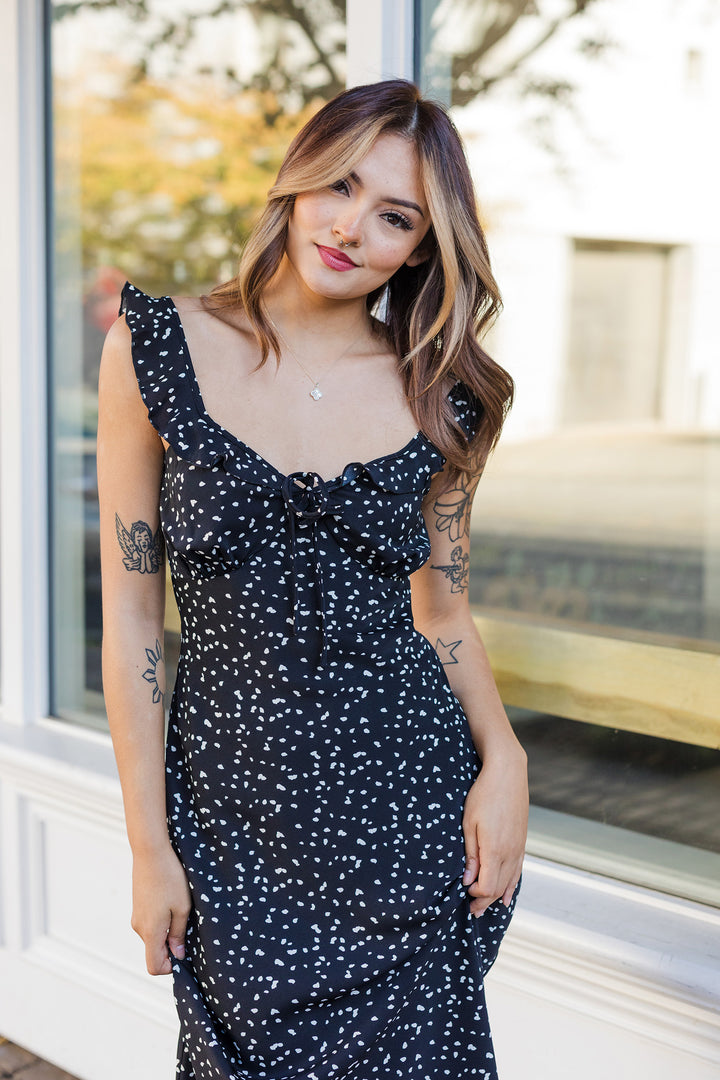 The Giving It A Whirl Black Polka Dotted Midi Dress