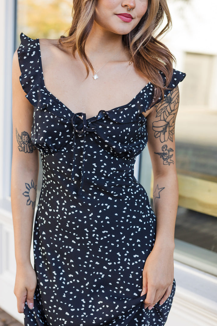 The Giving It A Whirl Black Polka Dotted Midi Dress