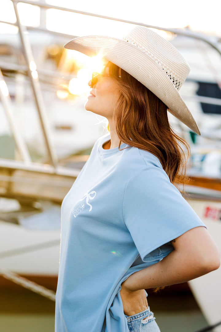 The Cowgirl Soft Blue Graphic Tee