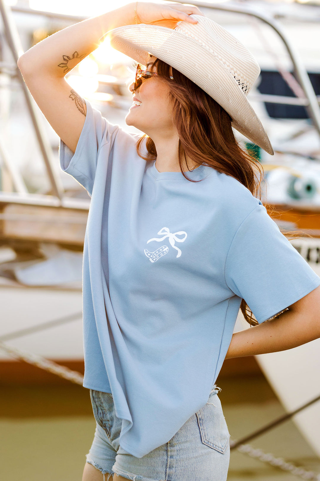 The Cowgirl Soft Blue Graphic Tee