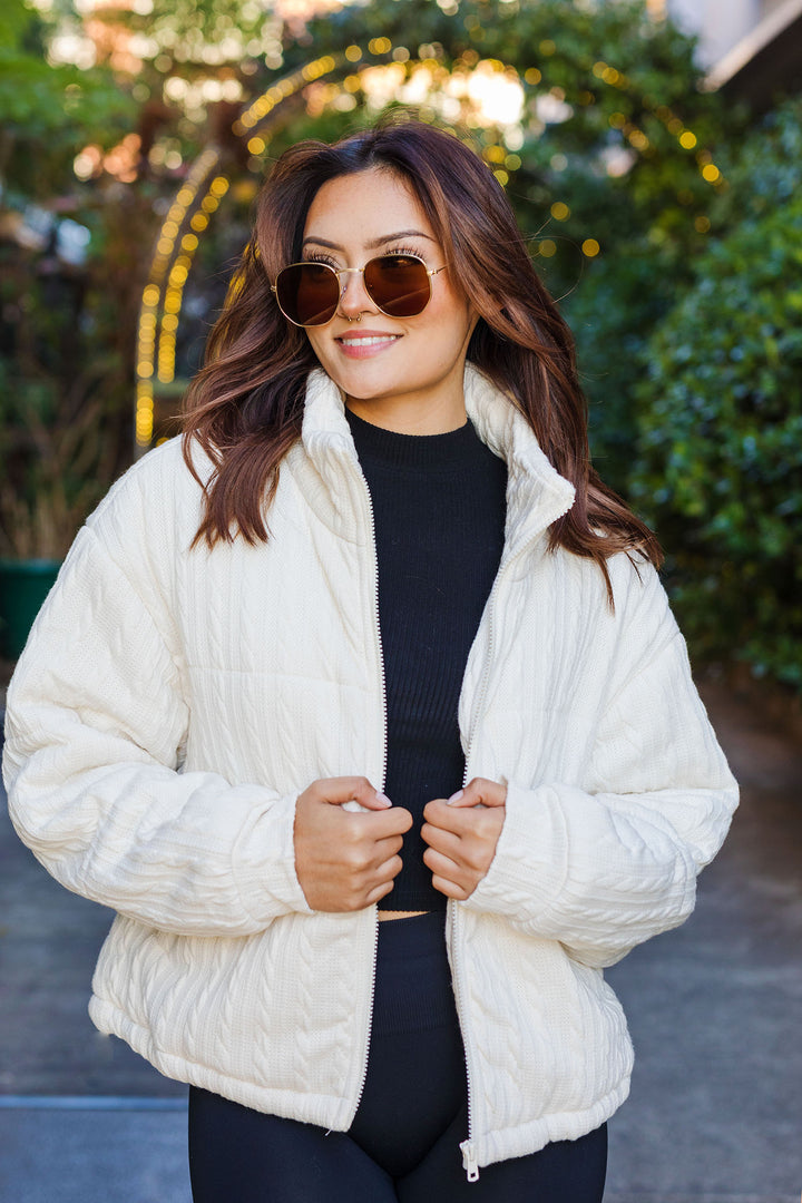 The Take A Chill Cream Cable Knit Puffer Jacket