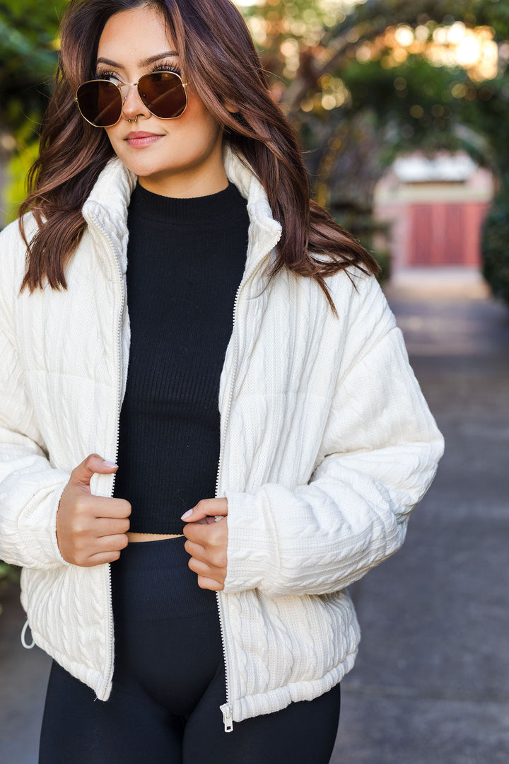 The Take A Chill Cream Cable Knit Puffer Jacket