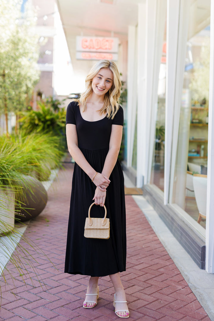 The Off the Record Black Wide Leg Jumpsuit